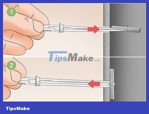 How to Hang a Flat Screen TV on a Drywall Picture 12