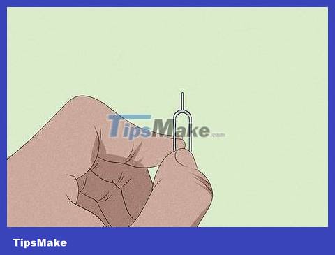 How to Insert SIM Card into iPhone Picture 4