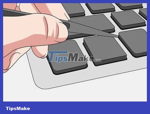 How to Temporarily Remove Keys from Macbook Picture 7