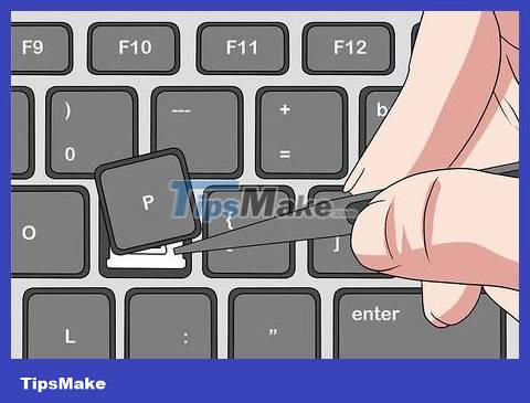How to Temporarily Remove Keys from Macbook Picture 9