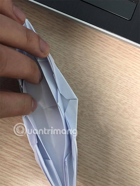 Picture 11 of How to fold a flat-bottomed boat with a canopy.