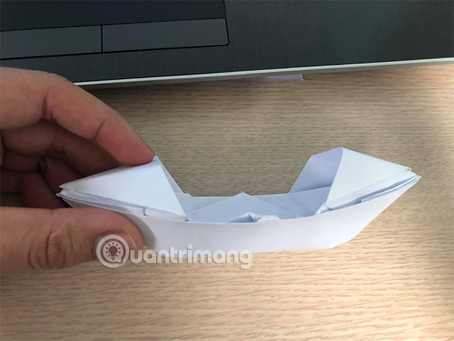 Picture 12 of How to fold a flat-bottomed boat with a canopy.