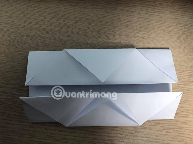 Picture 6 of How to fold a flat-bottomed boat with a canopy.