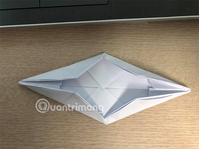 Picture 9 of How to fold a flat-bottomed boat with a canopy.