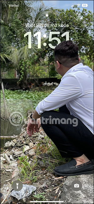 Picture 4 of How to set a wallpaper that doesn't cover your face on iOS 16 - following the trend.