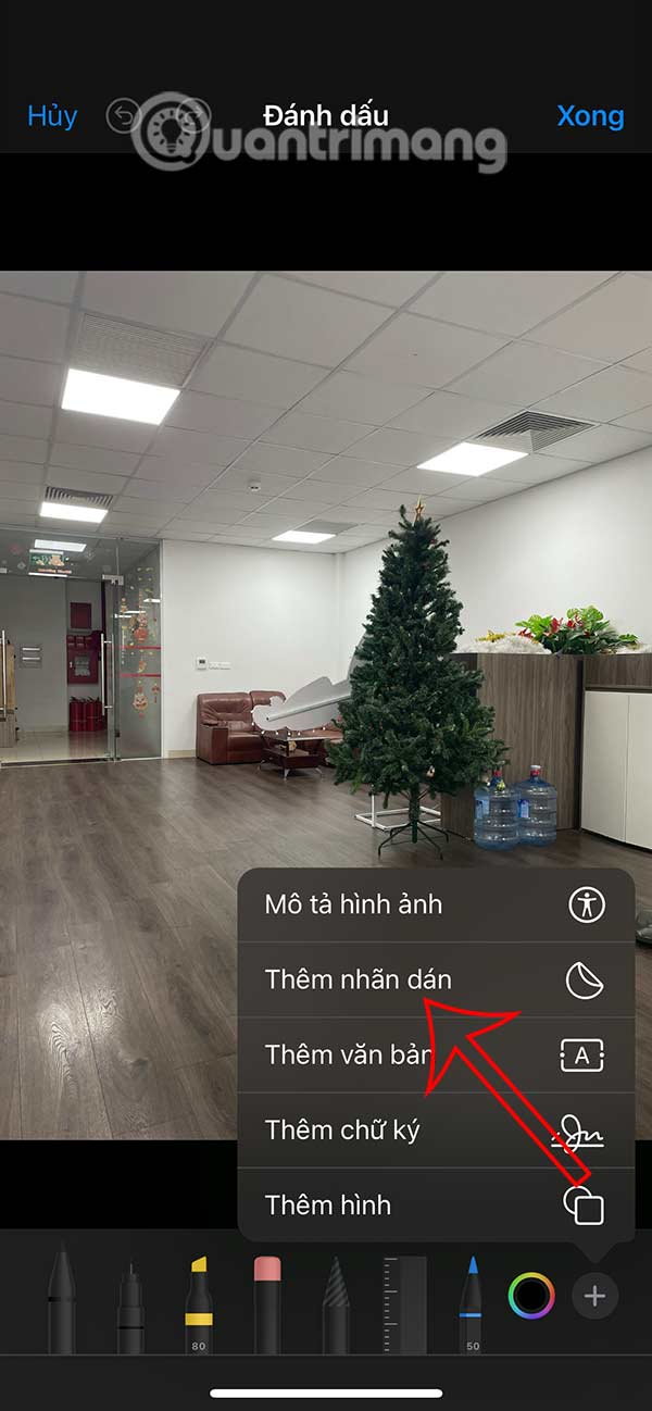 Instructions for inserting stickers into photos on iPhone Picture 4