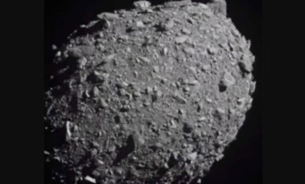 Picture 1 of NASA spacecraft successfully deflected asteroid's orbit in 'Earth rescue' experiment.