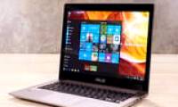 Adjusting screen brightness on an Asus laptop.