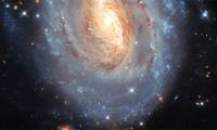 Admire the image of spiral galaxy NGC 6000 – Where old and young stars shine brightly together