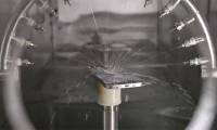 Close-up of the water and impact resistance test for Apple's iPhone 15