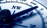 Which direction does a compass point in space?