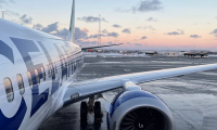 Why should you bring a USB-A cable on long flights?