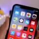 How to enable location services when taking photos on iPhone