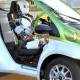 Photo of Humanoid robot drives itself and obeys traffic signals