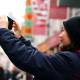 Photo of Why is street photography with a smartphone better than a DSLR camera?